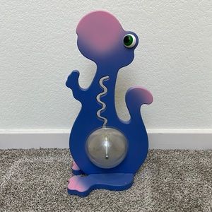 20” tall & 10” wide. Darling handmade pink & purple dinosaur piggy bank!